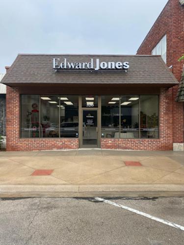 Front-lit channel letters on raceway installed with custom frame on awning.